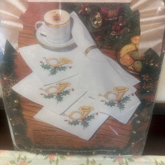 Bucilla Festive White Napkin Set with Gold and Green Design Stamped cross-stitch - Picture 2 of 4